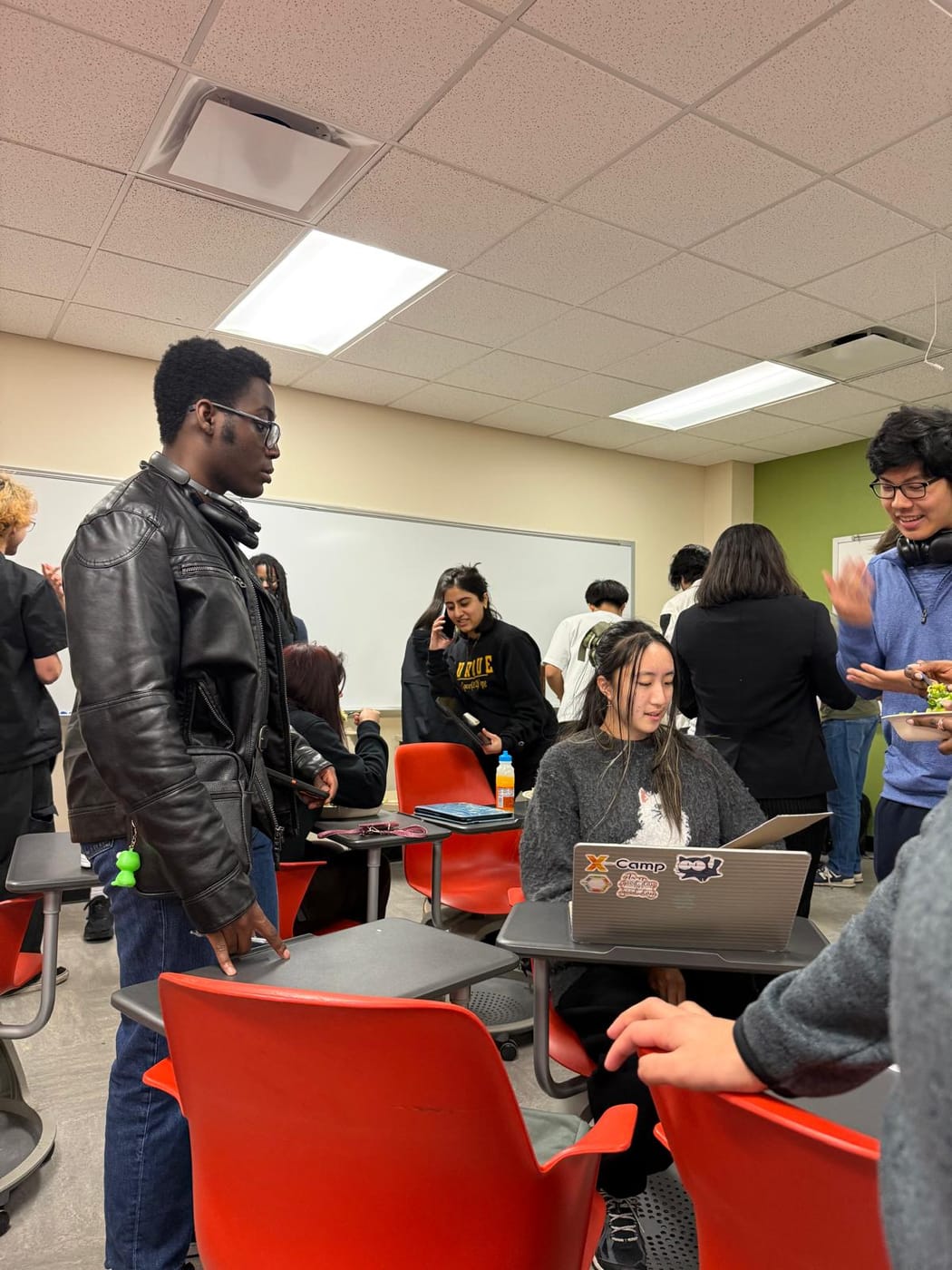 Students mingling over food at a CSWN networking event