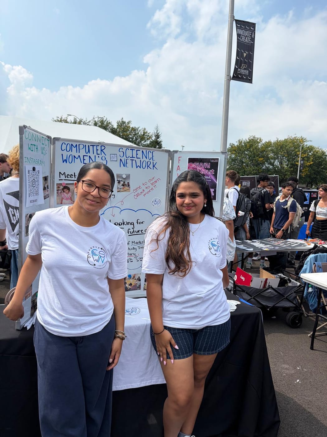 Officers running the CSWN table at the involvement fair
