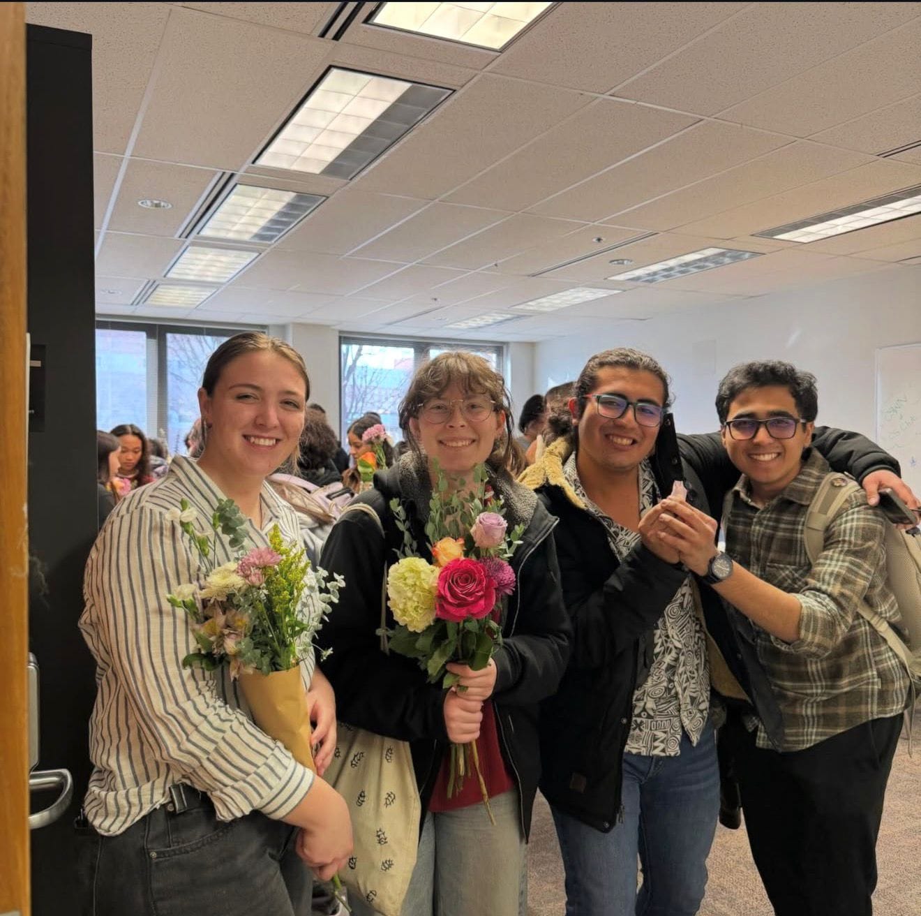 Members with the bouquets they built at a flower social